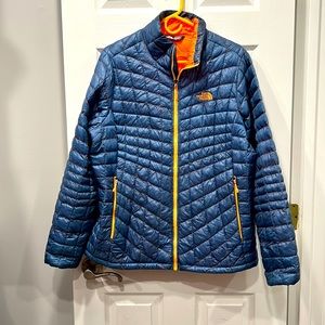 The North Face short waisted coat, blue and orange, Size XL